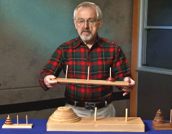 Picture of Professor Richard Larson holding a stick